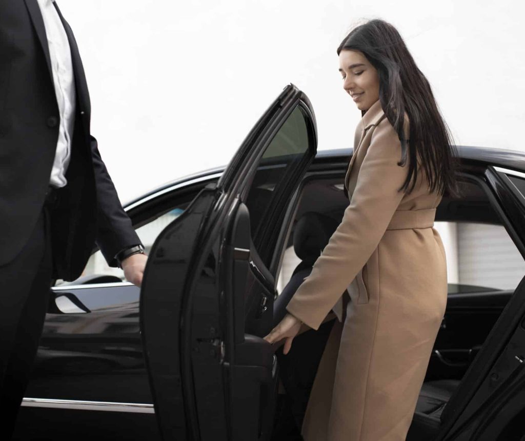 woman-getting-taxi-car-scaled